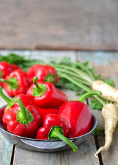 red pepper and parsley root on a wooden background.selective foc