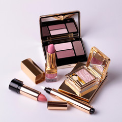 eyeshadow palette with mirror and lipsticks