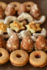 Decorated Christmas cookies on the brown plate