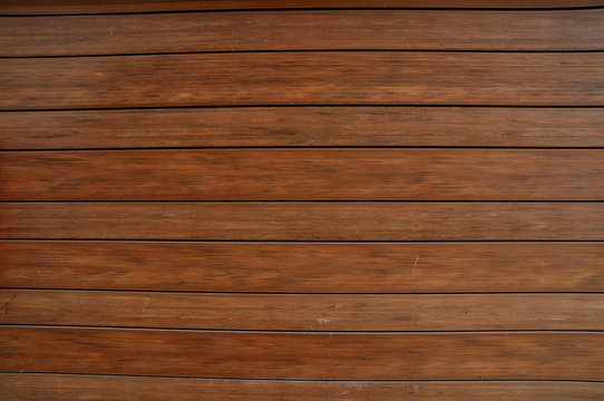 Brown wooden plank for web background.
