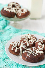 Chocolate donuts with white icing