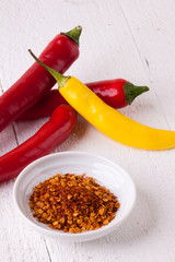 Fresh red and yellow chili peppers with spice