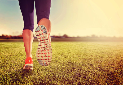  An Athletic Pair Of Legs On Grass During Sunrise Or Sunset - Healthy Lifestyle 