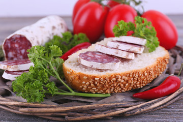 French salami with tomatoes, bread and parsley