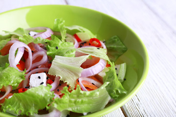 Fresh fish salad with vegetables