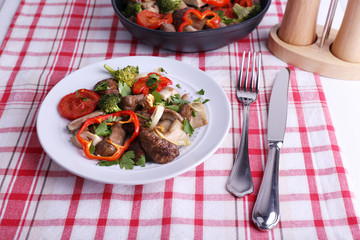 Braised wild mushrooms with vegetables and spices in pan and