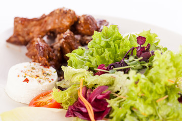 grilled beef stripes fresh salad and goat cheese