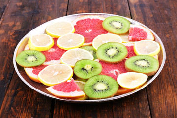 Ripe slices lemon, kiwi and grapefruit