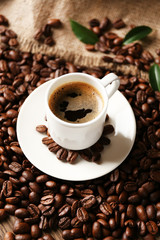 Cup of coffee on wooden table