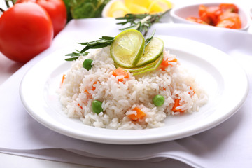 Vegetable rice served on table, close-up