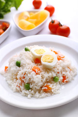 Vegetable rice served on table, close-up