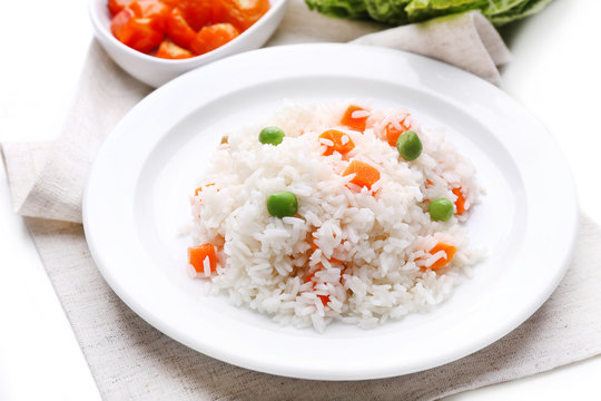 Vegetable rice served on table, close-up