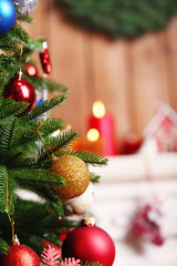 Fototapeta na wymiar Fireplace with beautiful Christmas decorations in room