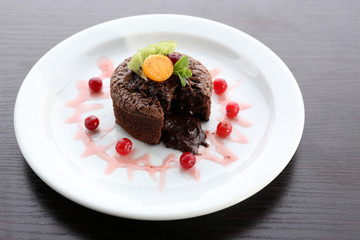 Hot chocolate pudding with fondant centre, close-up