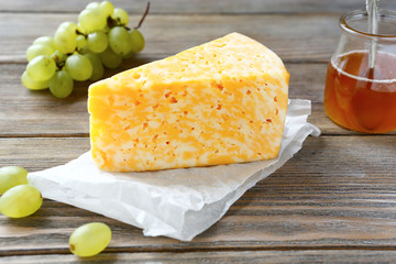 Cheese with grapes and honey