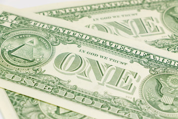 Close-up of one dollar on background