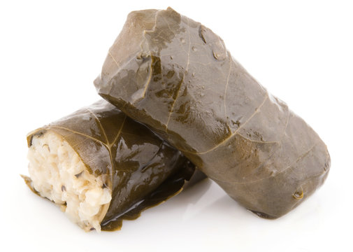 two rolls vine leaves stuffed with rice isolated