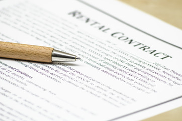 Rental contract with wooden pen