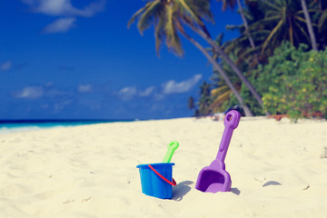 Fototapeta na wymiar kids toys on tropical beach