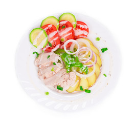Warm meat salad with vegetables