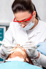 Naklejka premium Professional teeth cleaning