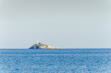 Lighthouse on the island in the sea