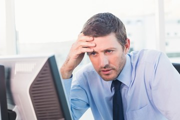 Concentrate businessman looking at his computer