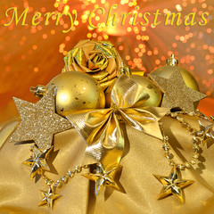 Christmas golden bolls, stars, roses on light background