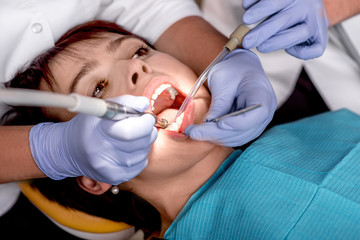 Senior woman on the dental operation.