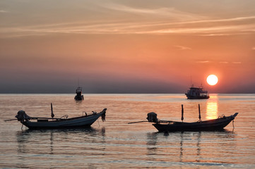 Long tailed boat Ruea Hang Yao at sunset in Krabi Thailand