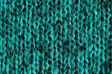 Bright green wool knitted background