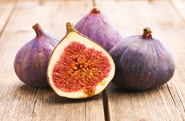 Fresh figs on wooden table
