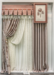 Interior decoration. Curtains with lambrequins and tulle