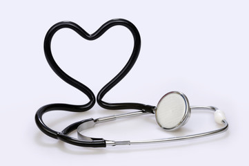 Stethoscope that forms a heart, on white background