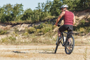 athlete man cycling on a bicycle