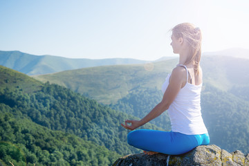 Fototapeta na wymiar Young woman meditate