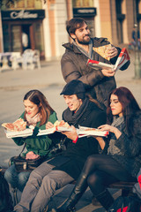 Friends Eating Pizza Outdoors