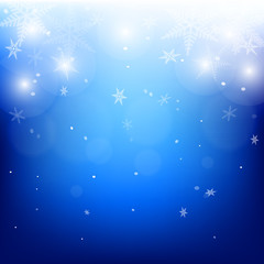 Winter background of snowflakes.