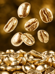 Gold coffee beans falling down