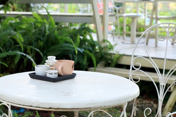 Cup of coffee and sugar on the table.