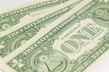 Close-up of one dollar on background