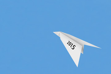 Paper plane on blue sky background