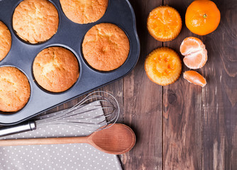 Homemade muffins with tangerines
