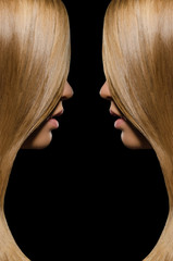 Profile of two women with straight hair