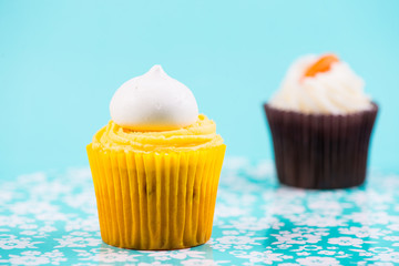cup cakes on blue background
