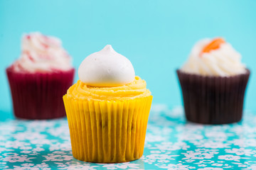 cup cakes on blue background