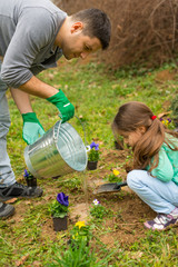 Naklejka premium Father and daughter in the garden