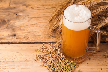 Glass of home made beer on table