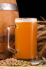 Glass of home made beer on table