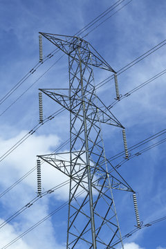 Top view of a transmission tower with high voltage power lines